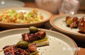 Twelve-Hour Braised Beef with Sour Green Cucumber and Toasted Bread