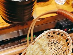 -老牌坊云南鱼豆花火锅(哈西万达店)