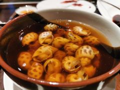 古越陈酿煮花螺-杭州西子湖四季酒店·金沙厅