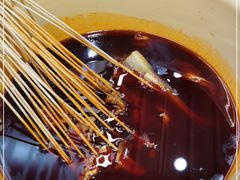 -拈签一笑黄牛肉辣卤串串