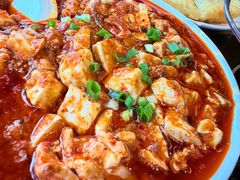 脑花烧豆腐-大众跷脚牛肉馆·非遗传承单位(峨眉山店)