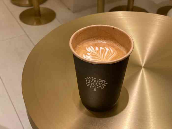 blooms coffee-"在k11的咖啡店据说是陈豪开的,黑金色的.