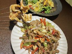 -曼听小寨海鲜烧烤·大连辣炒大王(盖州街店)
