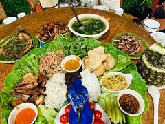 -沐毫傣泐云南菜孔雀宴•手抓饭傣味烧烤(曼听公园店)