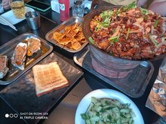 泥炉碳火牛蛙-西街夜油条·麻团包乌饭