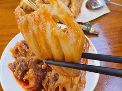 -爆炸头阿姨小四川正宗川味小吃(无任何分店)