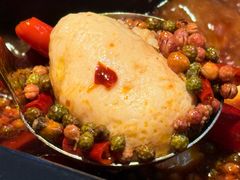 -老牌坊云南鱼豆花火锅(哈西万达店)