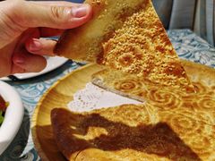 馕坑芝麻馕-巴扎美食·新疆菜·西域歌舞表演餐厅(新疆大厦店)