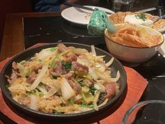 酸菜炒羊里脊-阿里家·新疆烤肉酒場 by MIG