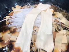 粘卷子-屯老二农家铁锅炖·行业领军者(梅江店)