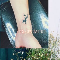 -SNOW TATTOO STUDIO