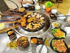 -彝人部落火盆烧烤(原内环足球场店)