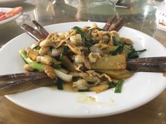 姜葱炒圣子-明记海鲜大排档(巽寮湾店)