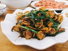 葱爆鱿鱼筒-明记海鲜大排档(巽寮湾店)