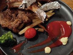 烤羊排-阿里家·新疆烤肉酒場 by MIG
