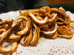 铁板香辣鱿鱼-草家酱蟹炭火烤肉店(珲春南路一店)