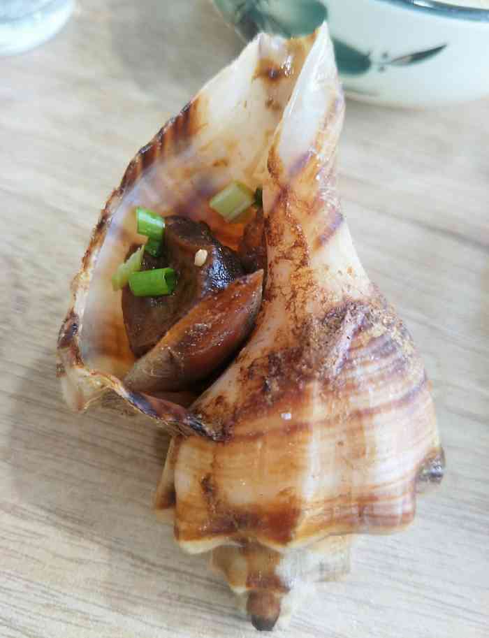 拐角海鲜烧烤-"拐角海鲜烧烤位于松江路与山东路交叉路口东.