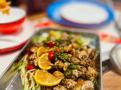 捞汁小海鲜花螺-那红花·东北菜铁锅炖(仙林金鹰店)