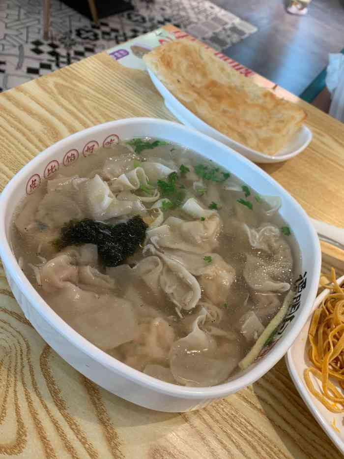 谭明白脆皮馄饨(老城区店)-"酸辣金汤云吞面77云吞面爱好者表示心