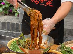 -拈签一笑黄牛肉辣卤串串