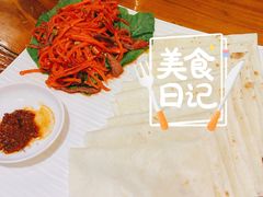 酸萝卜炒牛肉配饼-玛禄藏膳(五分店)