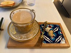 龟兹现煮奶茶配骆驼奶疙瘩-龟兹KUCINA·新疆菜(前滩L+PLAZA店)