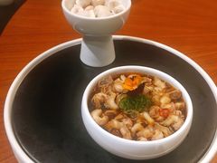 辣酒汁花螺配夏威夷果-木守西溪溪隐餐厅