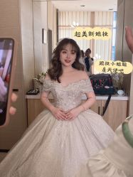 -觅白婚纱礼服馆