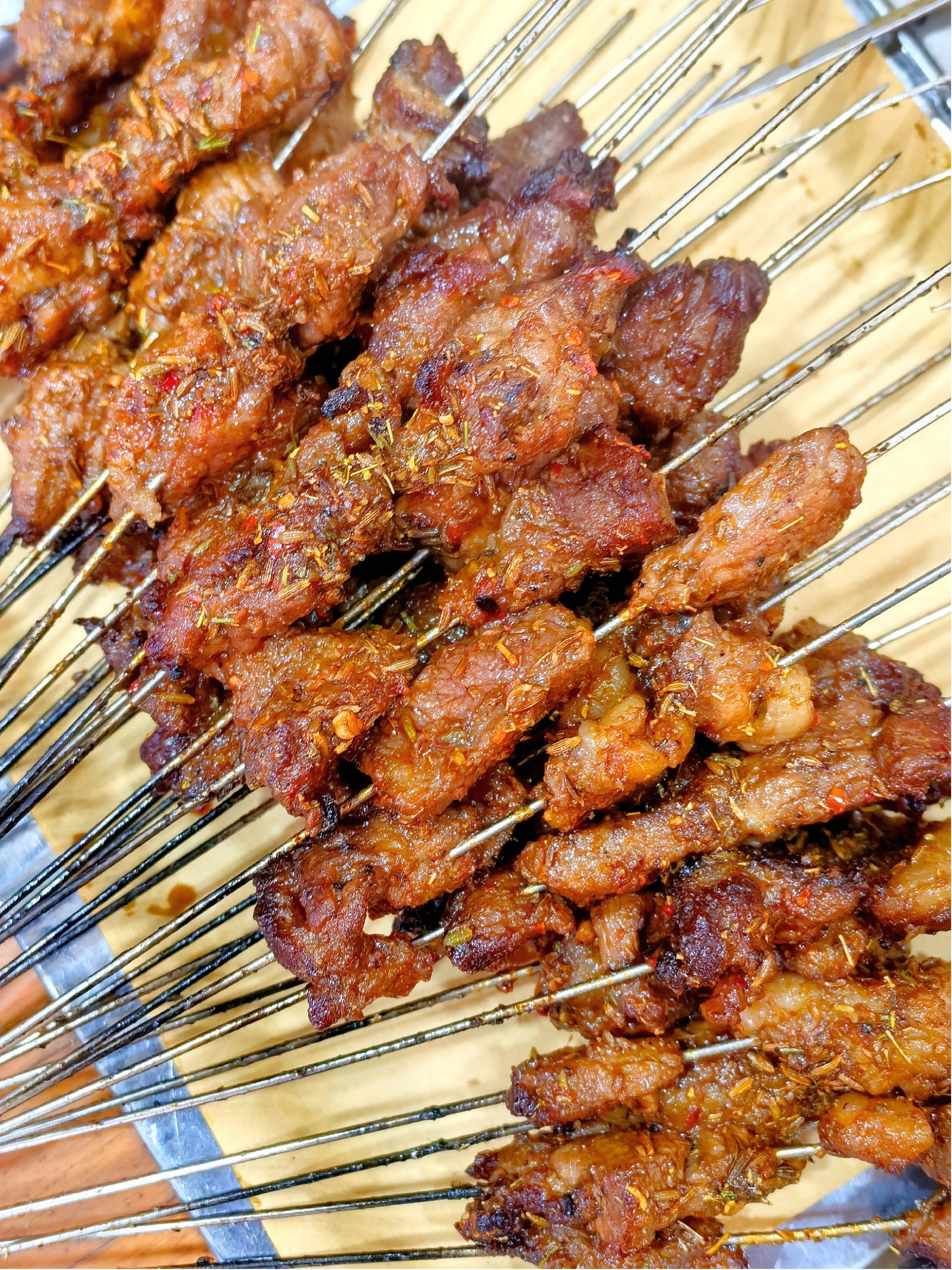 」他家是点的时候按份点,一份是十串或