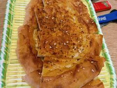 新疆烤馕饼-赛丽麦·牛肉面·美食博物馆(首经贸店)
