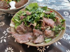 -牛四娃跷脚牛肉·非物质文化遗产传承名店(峨眉山店)