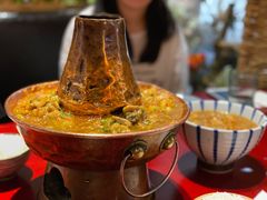 土司铜锅油焖鸡-浩海火烧云傣家菜(京广店)