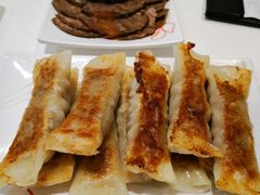 招牌猪肉圆白菜锅贴-嘉和一品粥(马家堡店)
