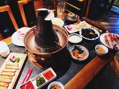 -老牌坊云南鱼豆花火锅(哈西万达店)