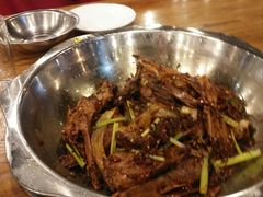 爆辣干锅鸭头-安诚居干锅鸭头(八角店)