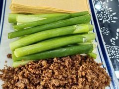 勾魂小媳妇-八两八金·莱芜特色炒鸡(市南漳浦路店)