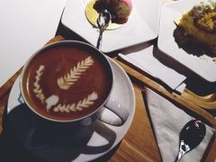 拿铁-sugarman espresso素饮糖人高新咖啡工厂