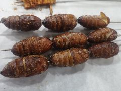 烤蚕蛹-大院涮烤·东北经典老味烧烤·铜锅涮肉(江南东路店)