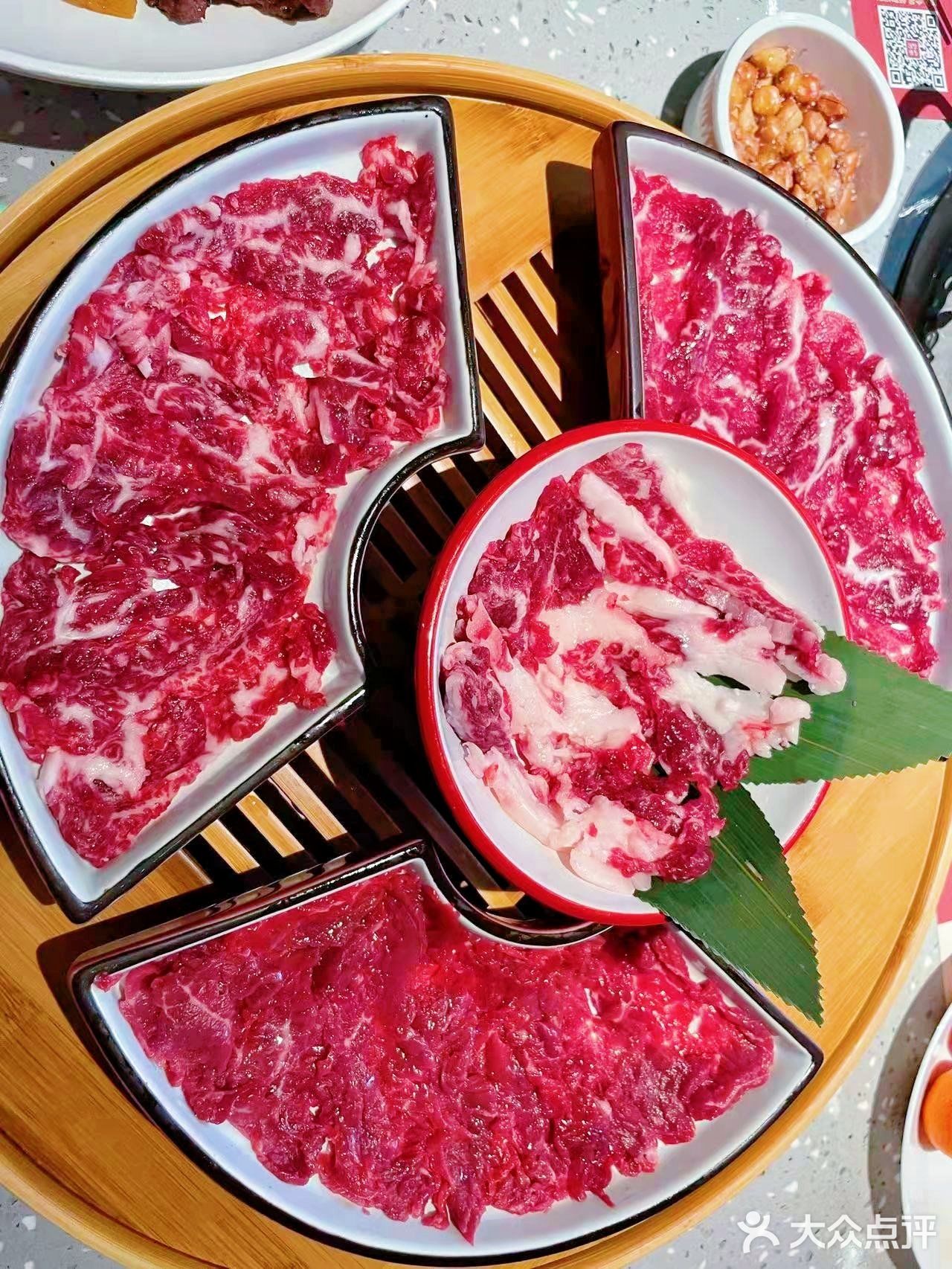 牛肉火锅吃过瘾[得意]左庭右院第100家店