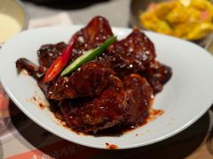 草家招牌酱辣蟹-草家酱蟹炭火烤肉店(珲春南路一店)
