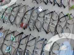 -上海网星眼镜批发·蔡司依视路官方授权(三叶眼镜城店)