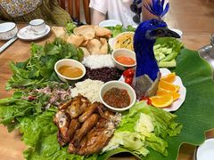 -沐毫傣泐云南菜孔雀宴•手抓饭傣味烧烤(曼听公园店)