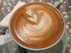 拿铁-sugarman espresso素饮糖人高新咖啡工厂