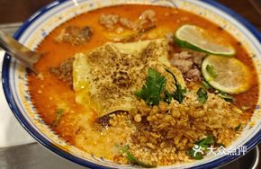 Fried Pork Belly Tom Yum Soup with Handmade Fish Noodles