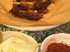 馕坑果木烤羊排-巴扎美食·新疆菜·西域歌舞表演餐厅(新疆大厦店)