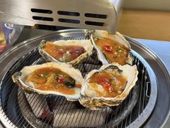 -围炉肉舍•炭烤活鳗•丹东海鲜烤肉(步行街店)