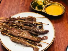 -何妹湿辣牛肉·粤式烧烤砂煲(桂雅路店)