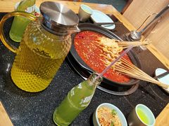 -明何记涮牛肚(品牌首店隋唐植物园南门古城路店)
