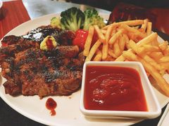 碳烤肉眼牛排及秘制牛排汁-WOLFGANG PUCK KITCHEN & BAR(迪士尼小镇店)