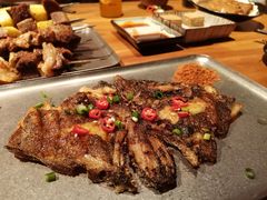 鸦片鱼头-阿里家·新疆烤肉酒場 by MIG